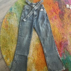 Brand new jeans with waist cutout